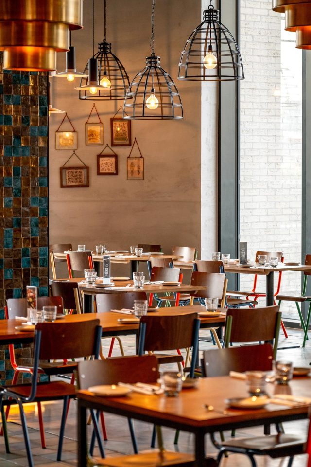 The casual and vibrant dining room interior at Masalchi Restaurant, Wembley Park.