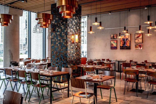 The vibrant, contemporary interior dining space at Masalchi Wembley Park.