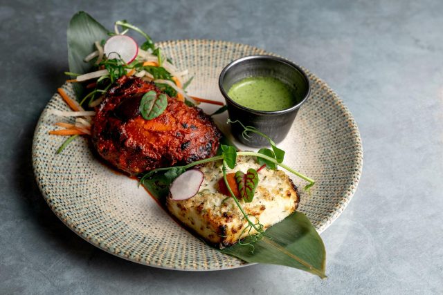 Gourmet tandoori chicken tikka and smoky grills at modern Indian restaurant in Wembley Park.